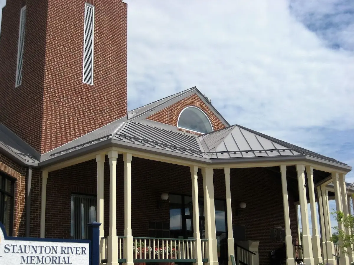 Skilled roofing craftsmen working on a residential roof in Saint Cloud
